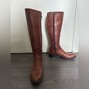 Tall brown leather boots